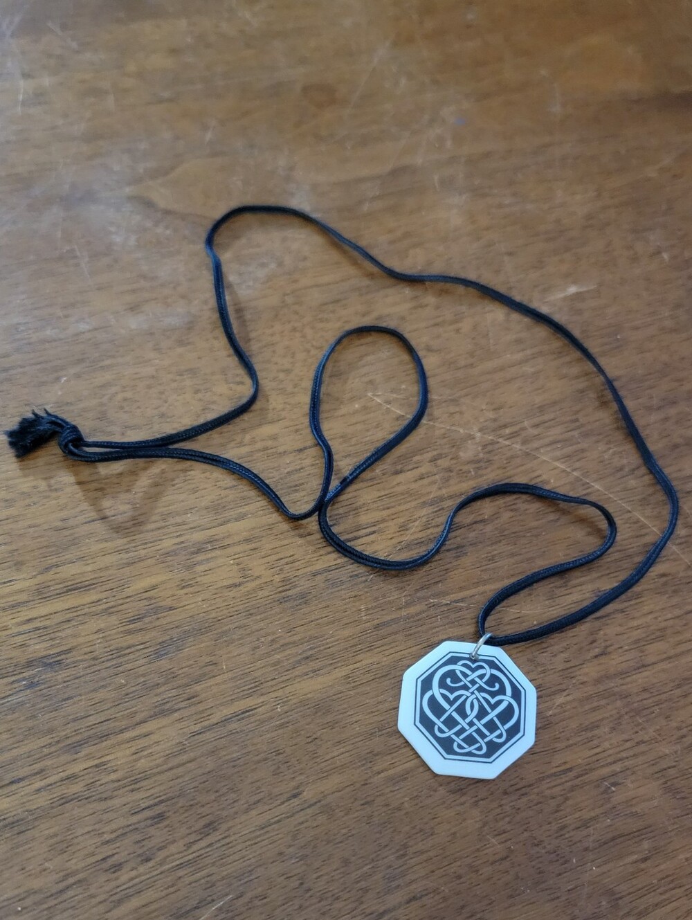 Celtic heart stone pendant on black cord